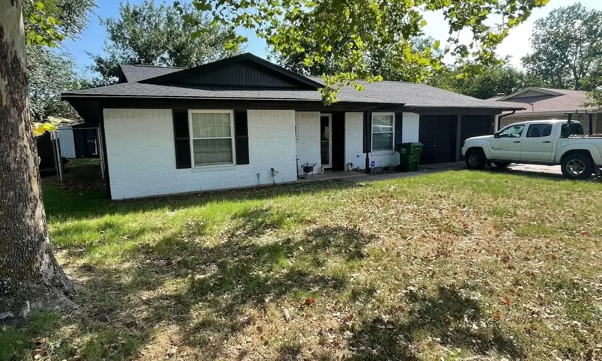 Professional roofing crew working on a residential roof in Mount Olive